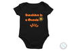 a black onesie with the words sunshine in a one - piece