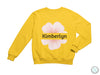 a yellow sweatshirt with a pink flower on it