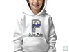 a young boy wearing a white hoodie with the letter p on it