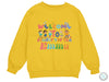 a yellow sweatshirt with the words welcome to the children